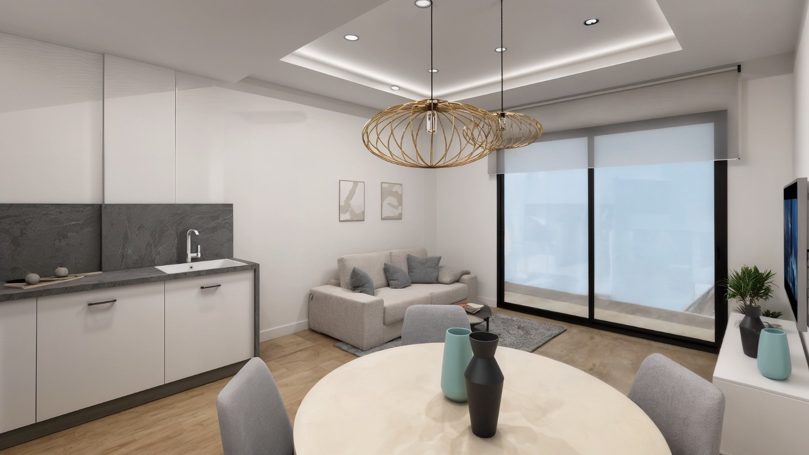 Salón-comedor con cocina abierta de una vivienda del residencial en El Campello